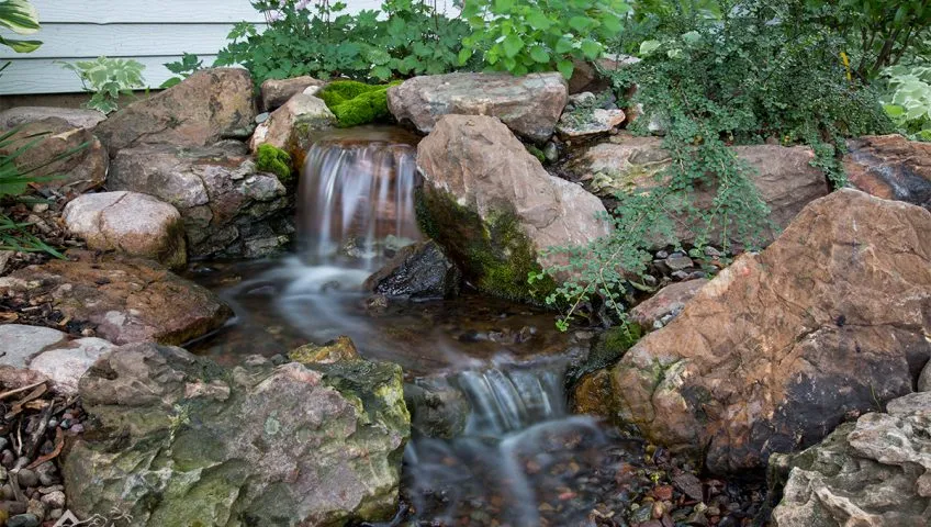 Pondless waterfall with stream